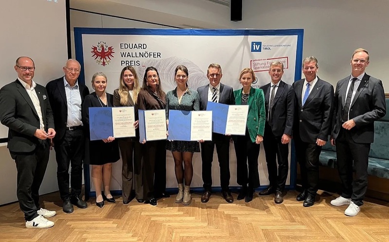 Group photo of the prize winners and hosts at the Eduard Wallnöfer Prize 2026 ceremony; Andreas Steinmayr, fifth from the right, holds Valentin Wett's certificate.